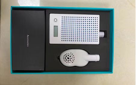 inside of package of  Portable HEPA air purifier with nose mask 